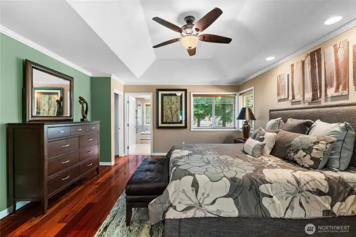 This spacious primary bedroom is also paired with it's on walk-in closet and en-suite bathroom.