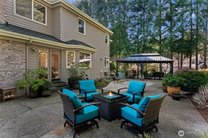 Escape into your own backyard retreat. Accessible through the primary bedroom and kitchen, this backyard allows for easy transitions for indoor to outdoor enjoyment!