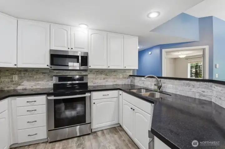 Updated kitchen with stainless steel appliances
