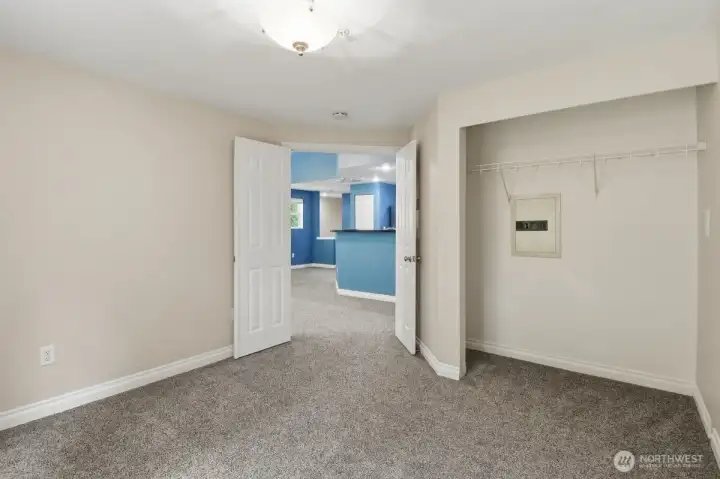 Flex room for bedroom, office/den with wall safe and french doors