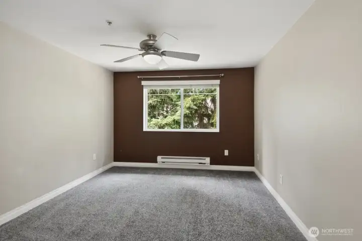 Primary bedroom w/ accent wall