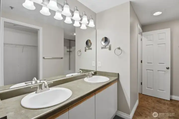 Primary bath vanity with dual sinks and updated fixtures