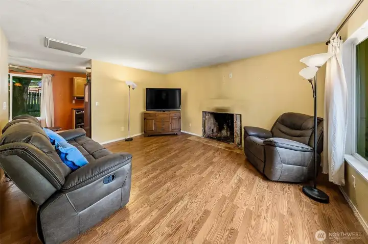Living room looking into dining room on left