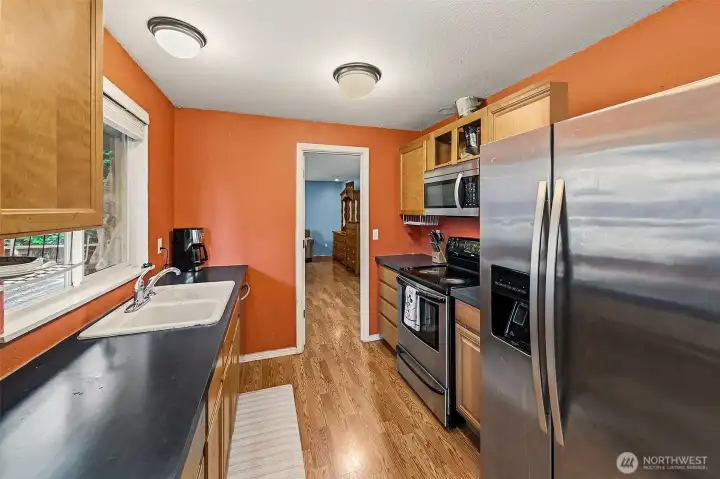 Kitchen with doorway to great room