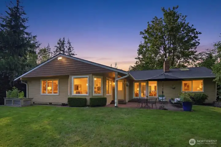 Gorgeous level backyard with garden beds, fruit trees, large lawn and paver patio for relaxing on summer evenings. Gorgeous level backyard with garden beds, fruit trees, large lawn and paver patio for relaxing on summer evenings.