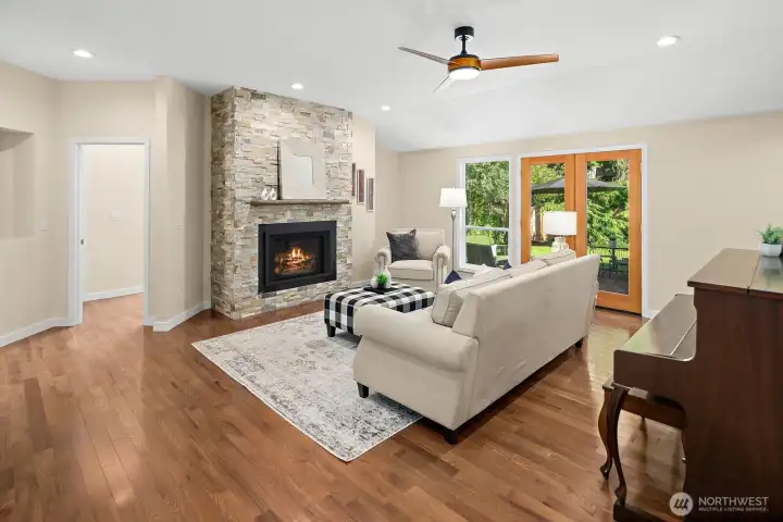 Stunning living room with 2018 FP and French doors to the patio and backyard. Stunning living room with 2018 FP and French doors to the patio and backyard.