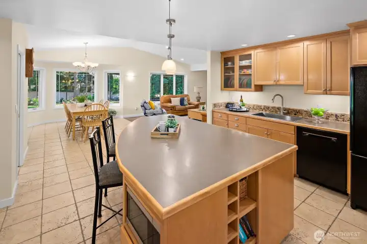 Kitchen opens to a large eating area and family room with vaulted ceilings. The nook and family room were a permitted addition in 2000. Kitchen opens to a large eating area and family room with vaulted ceilings. The nook and family room were a permitted addition in 2000.