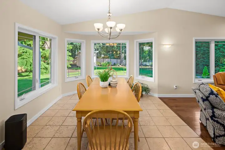 The dining area with radiant floor heating is designed to take advantage of the backyard views. The dining area with radiant floor heating is designed to take advantage of the backyard views.