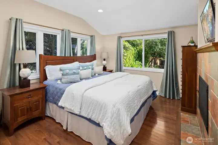Primary Suite with wood burning FP, walk-in closet and full bathroom. Primary Suite with wood burning FP, walk-in closet and full bathroom.