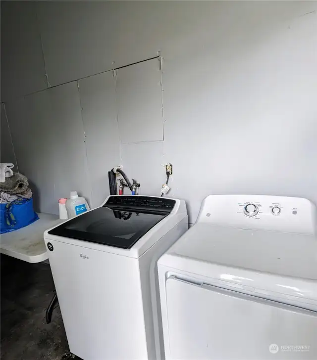 Shared laundry room in the back of the house with it's own locked entrance.