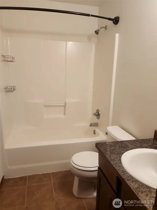 Primary bathroom with stand in shower & tub!