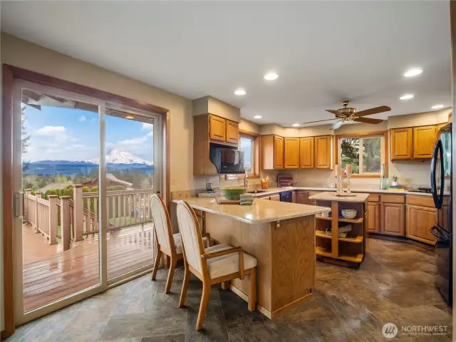 Step right outside from the kitchen to the large back deck.