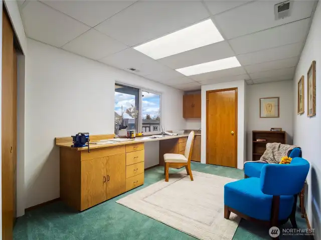 The private office or craft room is right off the garage. This could also be a super private guest room should you need it.