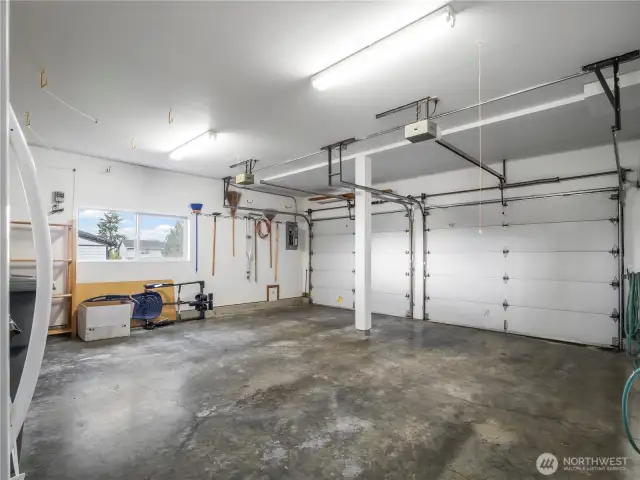 The large garage has room for two cars and a work space.