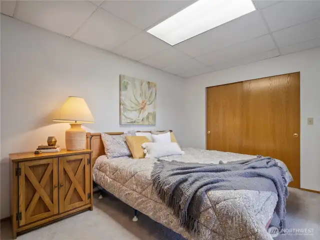 This bedroom has room for a king size (here shown with a queen)