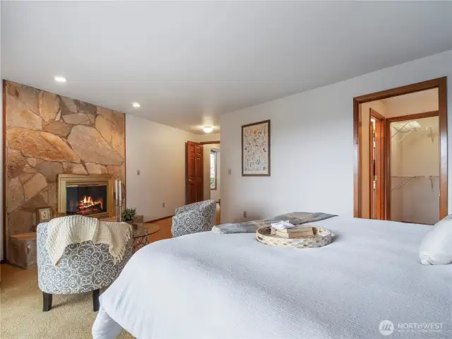 The fireplace is covered in natural quarry stone.