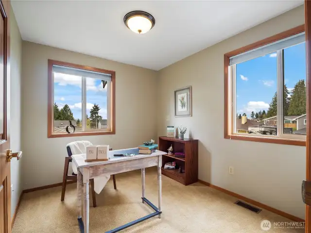 Anther bedroom on the main floor (here staged as an office).