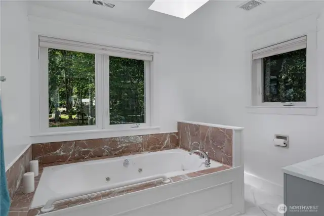 Upstairs bathroom with whirlpool bath.