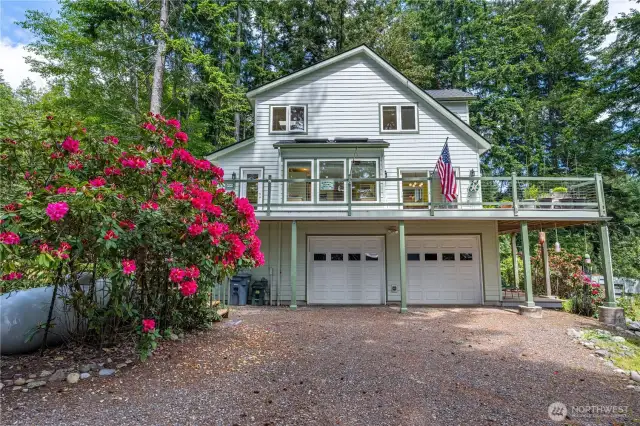 2 car garage plus large shop.  Expansive deck.