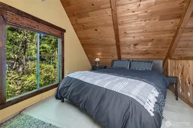 The upstairs loft feels safe and warm and cozy in a tree house like setting.