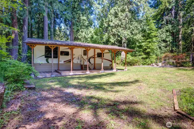 On the 2nd lot you'll find the Laredo RV for additional guest as well as a firepit and garden space.
