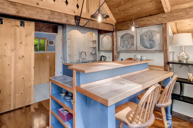 The open kitchen, with breakfast bar, is smartly laid out and efficient