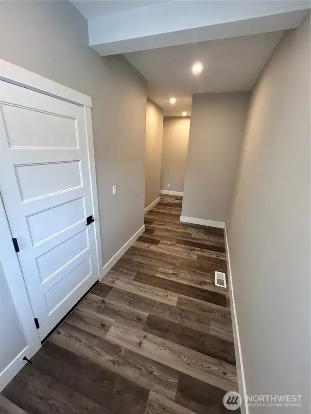 Back door entry with wide foyer - Flooring is a buyer selection. *Previous build