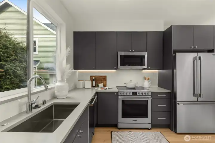 The kitchen is designed for both culinary creativity and daily ease.