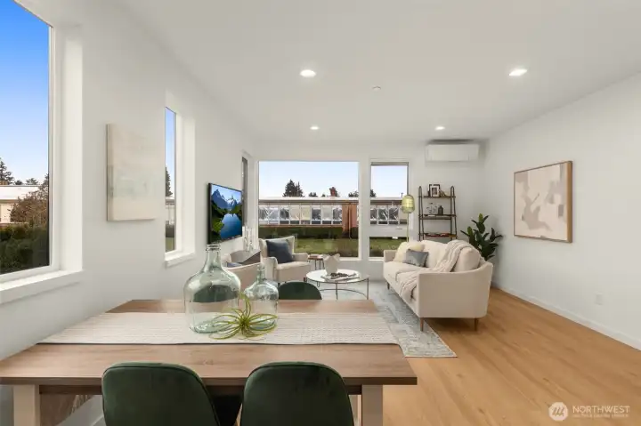 The open-concept layout connects kitchen, dining, and living areas, creating a space that adapts easily from weekday routines to weekend gatherings.