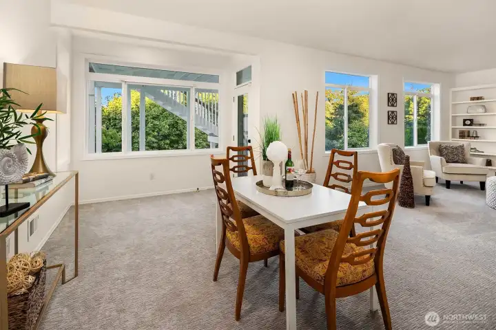 The lower level features a separate entrance, high ceilings, and tons of room for living and dining.