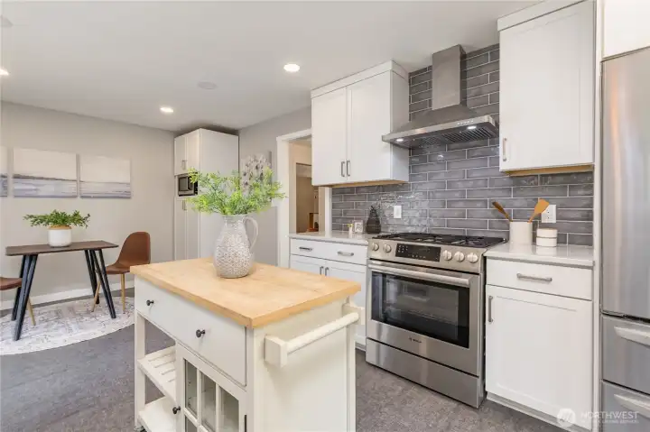 Breakfast nook in the kitchen area offers informal dining