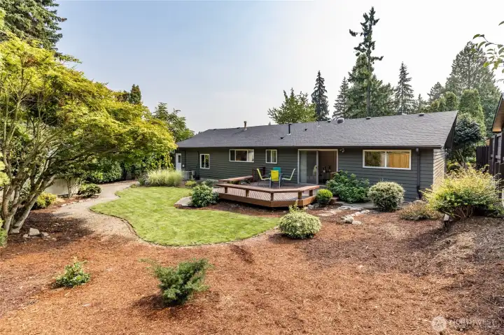 Fully-fenced back yard has plenty of space for play or relaxation