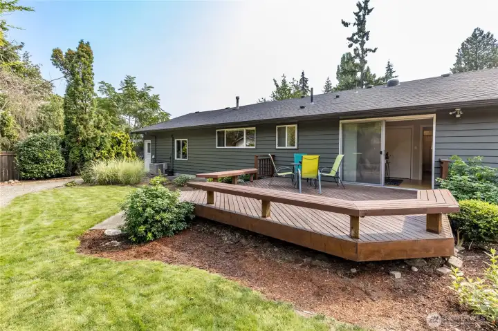 Large deck has built-in benches. Great for entertaining!