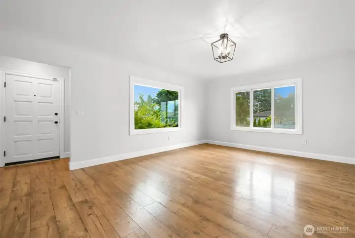 Large living room entrance with gorgeous hardwood floors