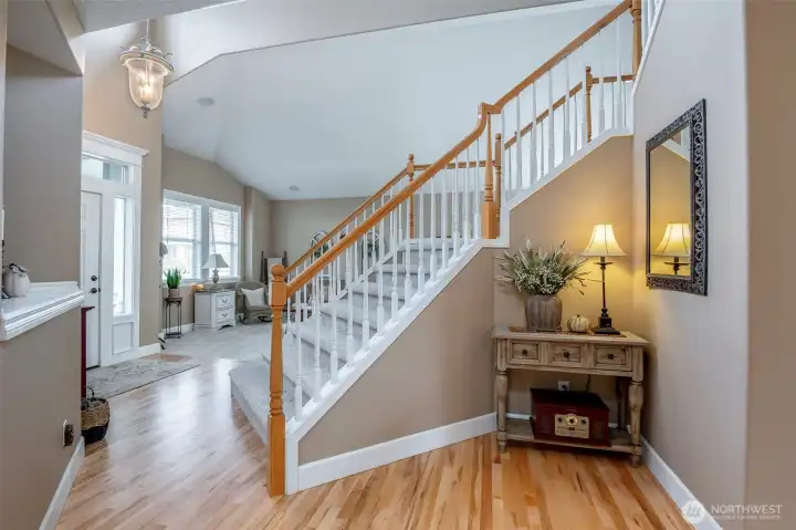 Staircase serves as the heart of home, allowing flow all the way around the main floor.