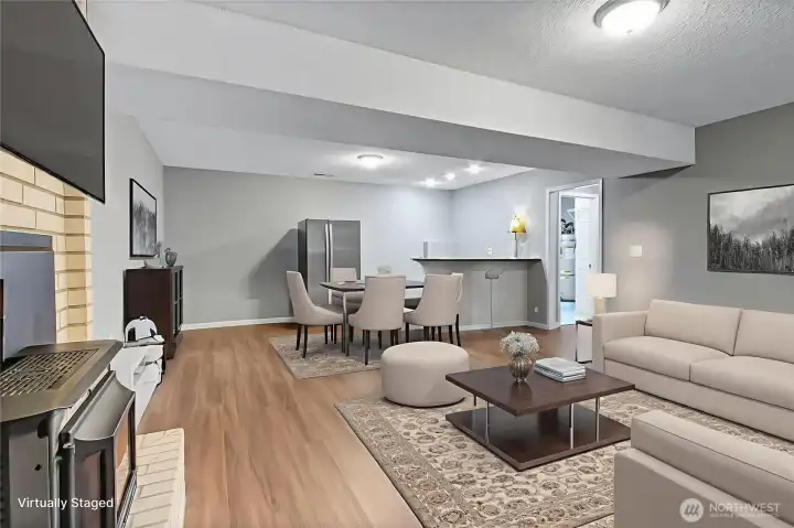 Lower level bonus room with pellet stove, wet bar and extra refrigerator included