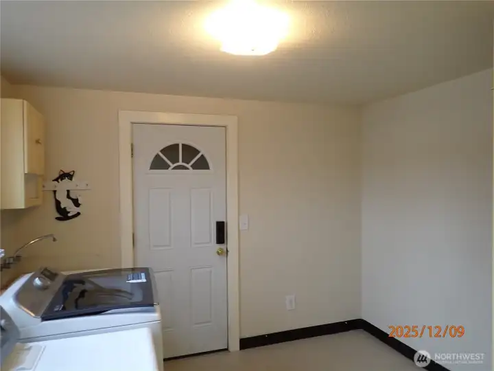 Laundry leading to garage