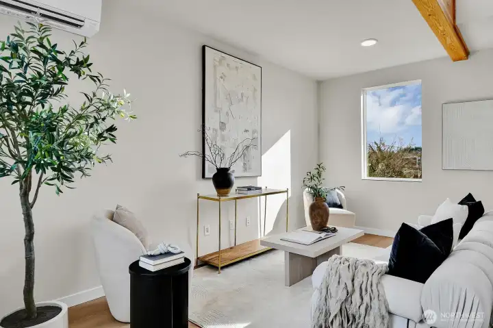 the open main floor level's living area affords Mt Rainier views and plenty of light.