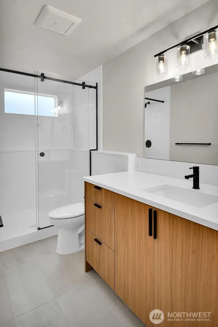 an elegant 3/4 bath.