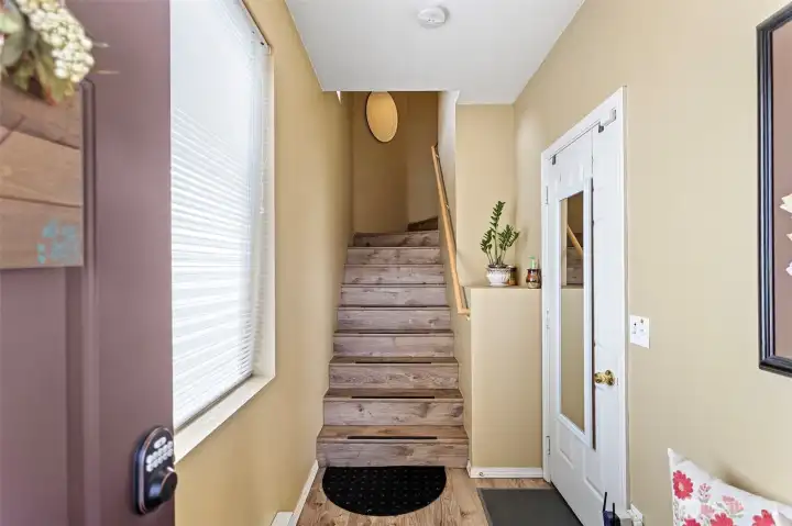 Welcome home, enter through your front door or via the garage.