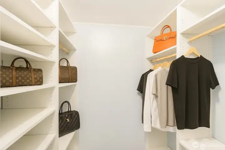 Huge walk in closet with thoughtful built ins!