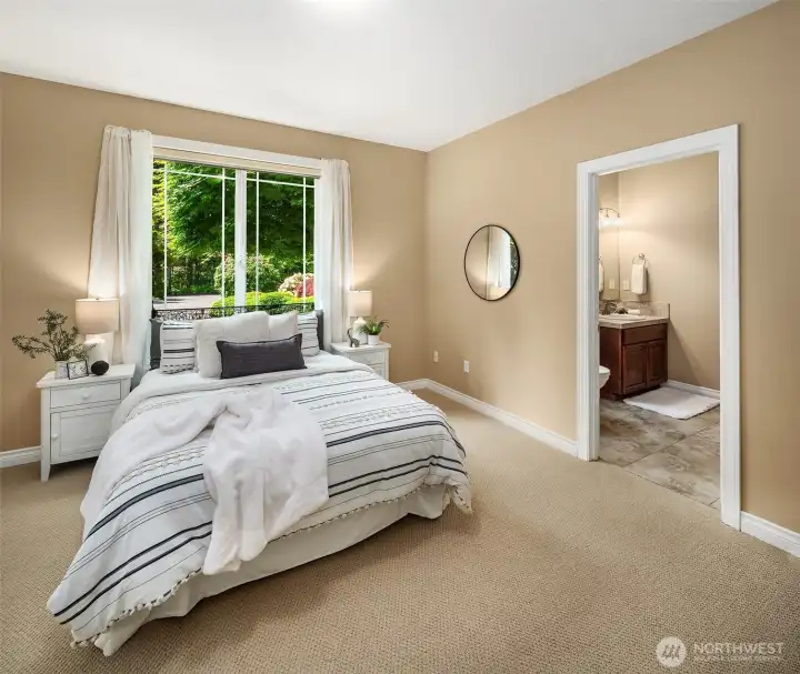 2nd primary/guest suite with walk in shower on main level
