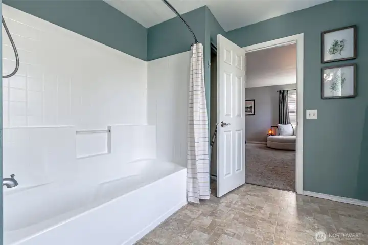 Primary bath has a nice sized soaking tub.