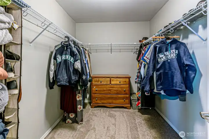 Large walk in closet in primary suite.