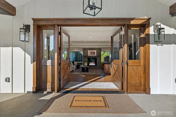 Custom Home Design with Large Entryway and Double Doors - Welcome Home.