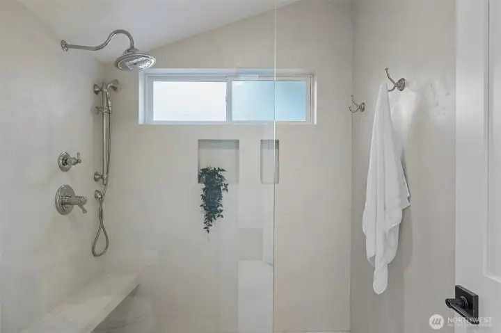 Spacious Overhead Shower w Additional Handheld Sprayer.