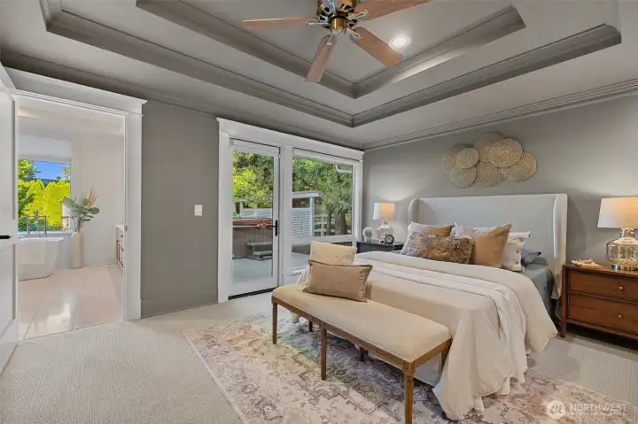 Primary Bedroom easy Access to Hot Tub and Backyard.