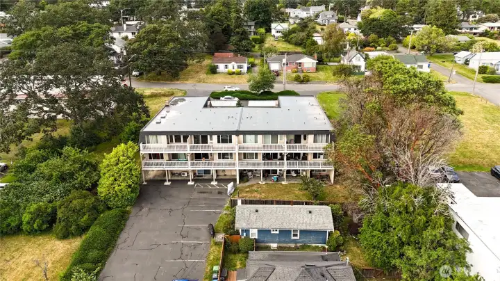 Aerial back of unit highlighting new roof