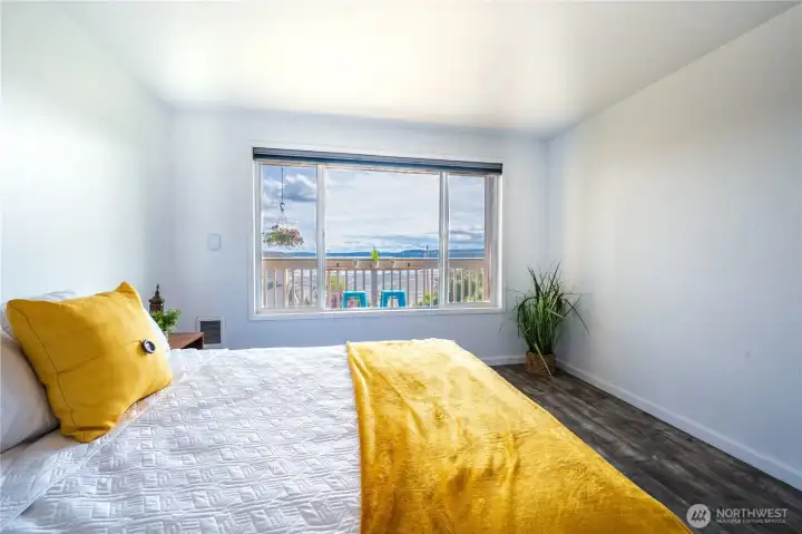 Primary bedroom with bay and mountain views for days!