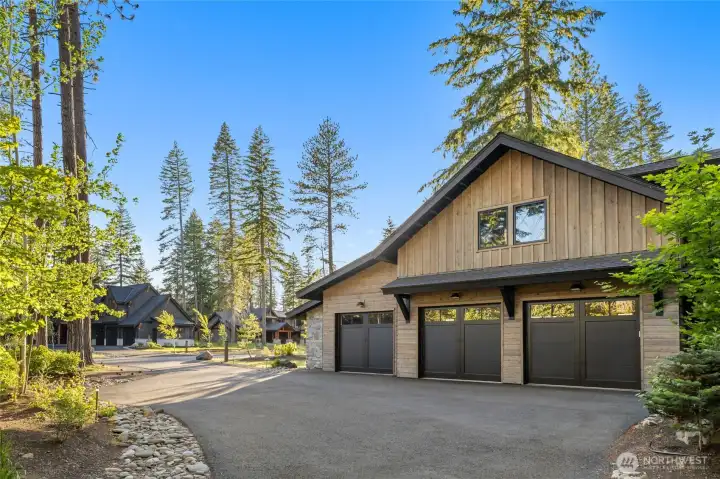 Three car garage with extended driveway for parking